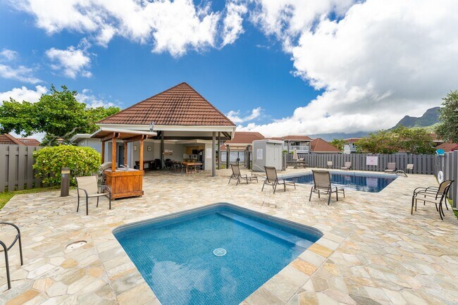 Building Photo - Lakeside, fully furnished, two bedroom, one bath townhome with enclosed garage.