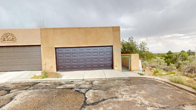 Building Photo - Updated Cochiti Lake Townhome with Views, Garage, Kiva Fireplace & Balcony