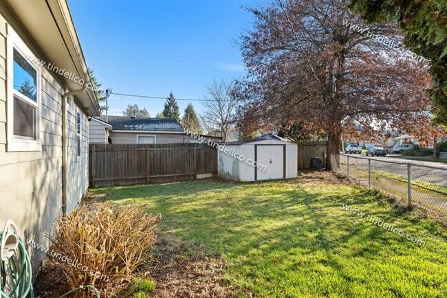 Building Photo - Cozy 2BR Corner Lot Home with Garage, Shed & Fenced Yard!