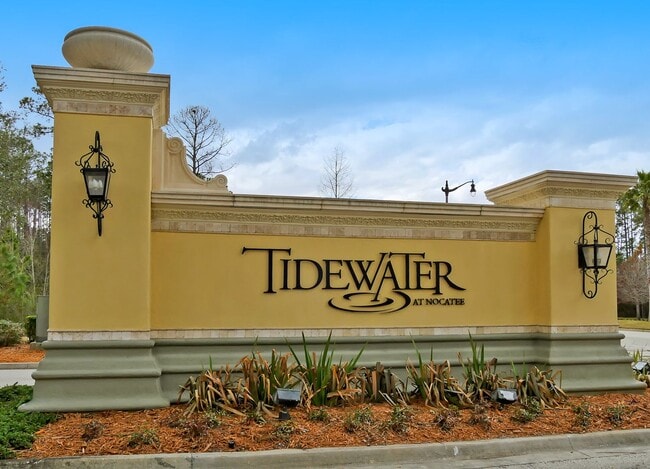 Building Photo - Introducing a captivating 3-story townhome...