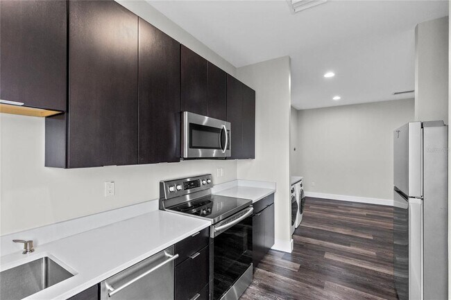 Building Photo - 14105 Corrigan Ave