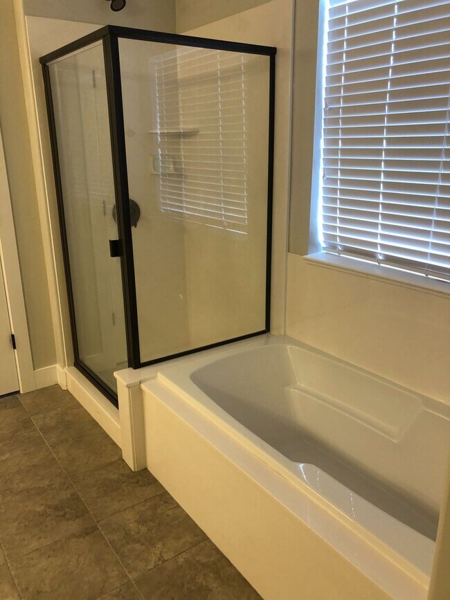 Building Photo - AMAZING HOME IN SOUGHT AFTER EXCHANGE DEVELOPMENT W/ 2 CAR GARAGE