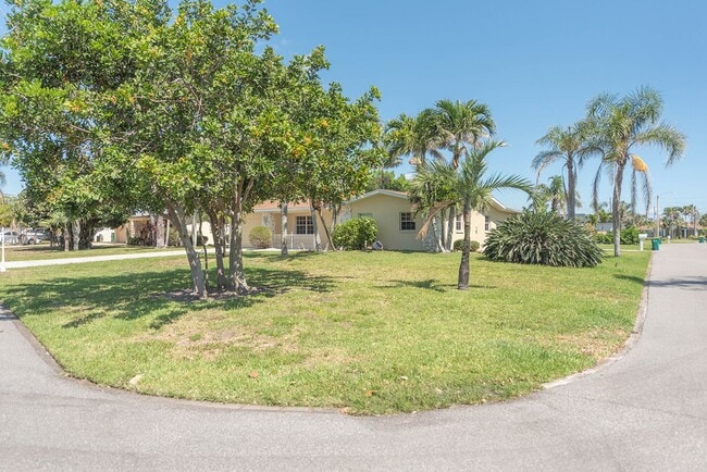 Building Photo - Indian Harbor Beach Stunner! Corner Lot Cl...