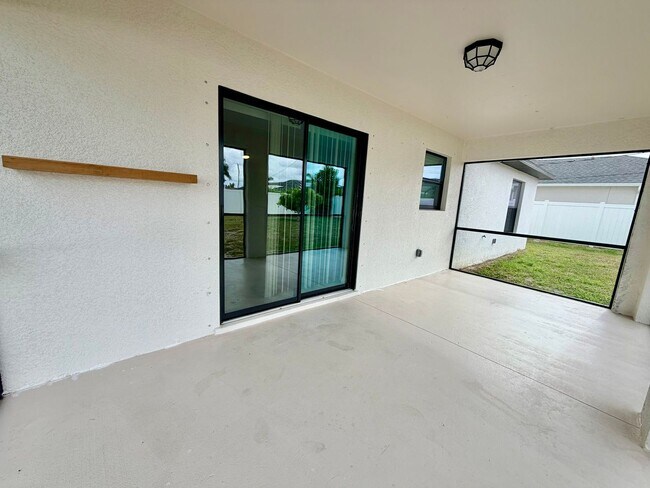 Building Photo - Move-In Ready 3BR Home in SW Cape Coral with Fenced Yar+Screened Lanai+Lawn Care Included+Pet Fri...