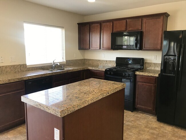 Building Photo - Now Available – 4 Bedroom Home with Loft i...