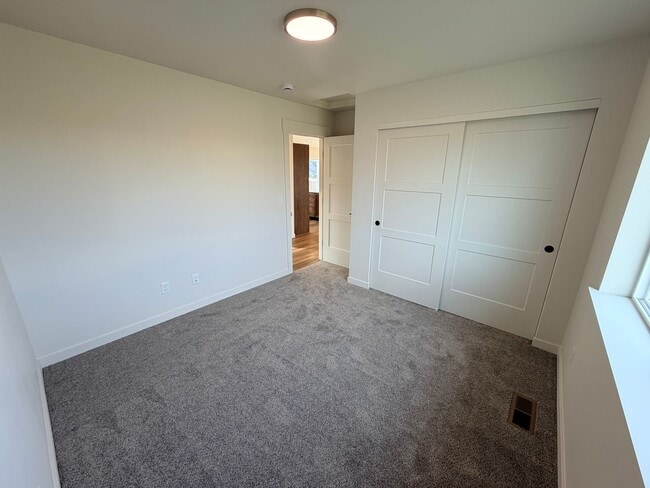 Building Photo - BRAND NEW construction! 3 beds, 2 baths, double garage, deck with VIEWS and more!