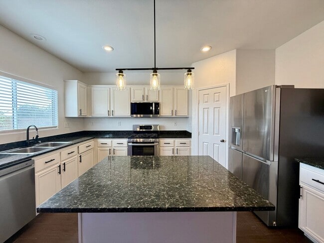 Building Photo - COMING SOON 5/BD 3/BA Home W/ Expansive Yard, Solar Panels, and No Rear Neighbors!