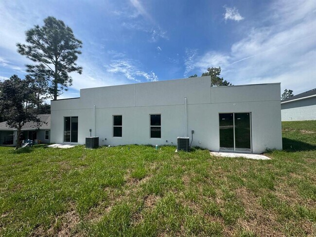 Building Photo - 9187-9189 N Travis Dr