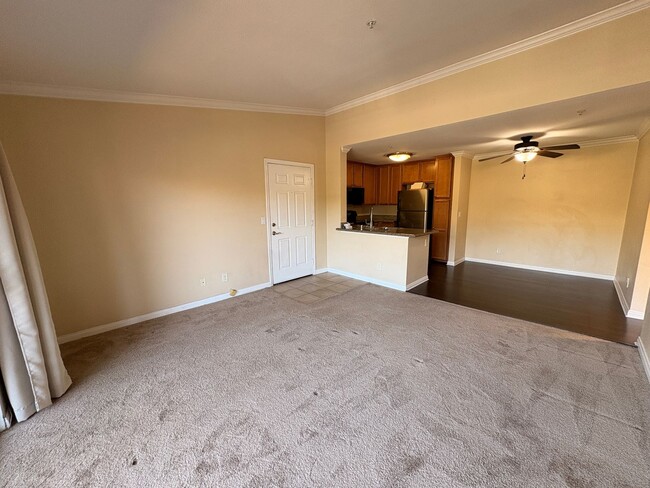 Building Photo - 1BR Condo with Private Balcony, Central A/C & Community Amenities in Corona