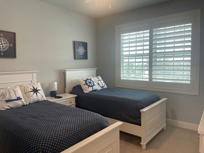 Building Photo - Coastal Luxury at Hidden Bay | 3BR Waterfront Condo with Bay Views