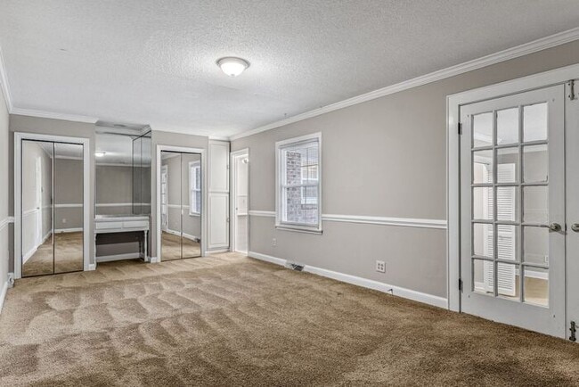 Building Photo - McLeansville - Minutes from Elon & Greensboro! Brick Duplex on a few Acres, Den, SS Appliances, F...