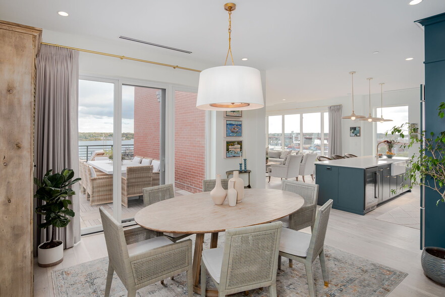 Beautiful boutique dining table with Serena and Lily chairs. - 387 Commercial St