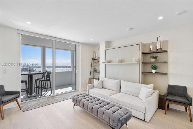 Building Photo - 10275 Collins Ave