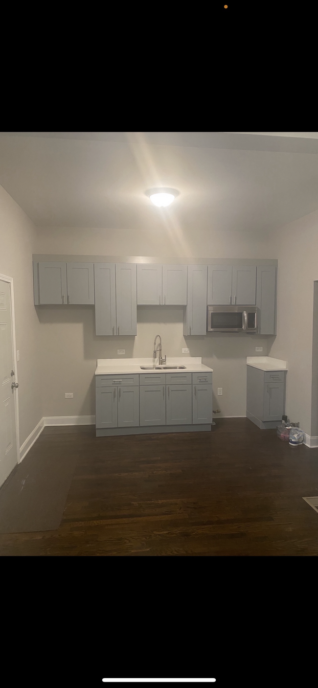 Kitchen floors - 7029 S Wentworth Ave