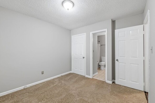 Building Photo - NW - Updated Home with Granite Counter-tops, Fire Place, Deck, Storage Building, Garage!