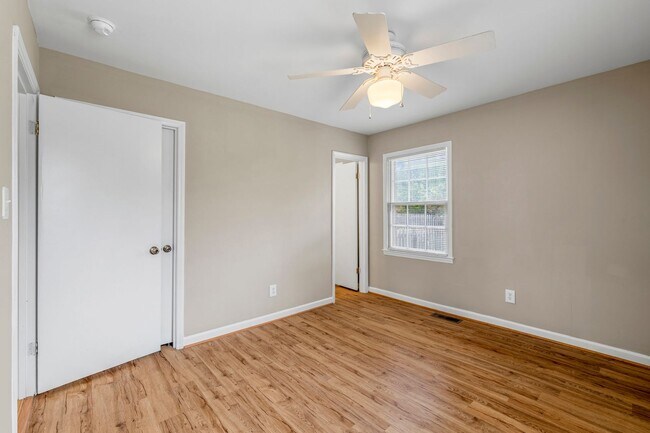 Building Photo - Large Renovated Ranch Home, Two Kitchens & Two Living Areas, Hardwood Flooring, Deck, Fenced!