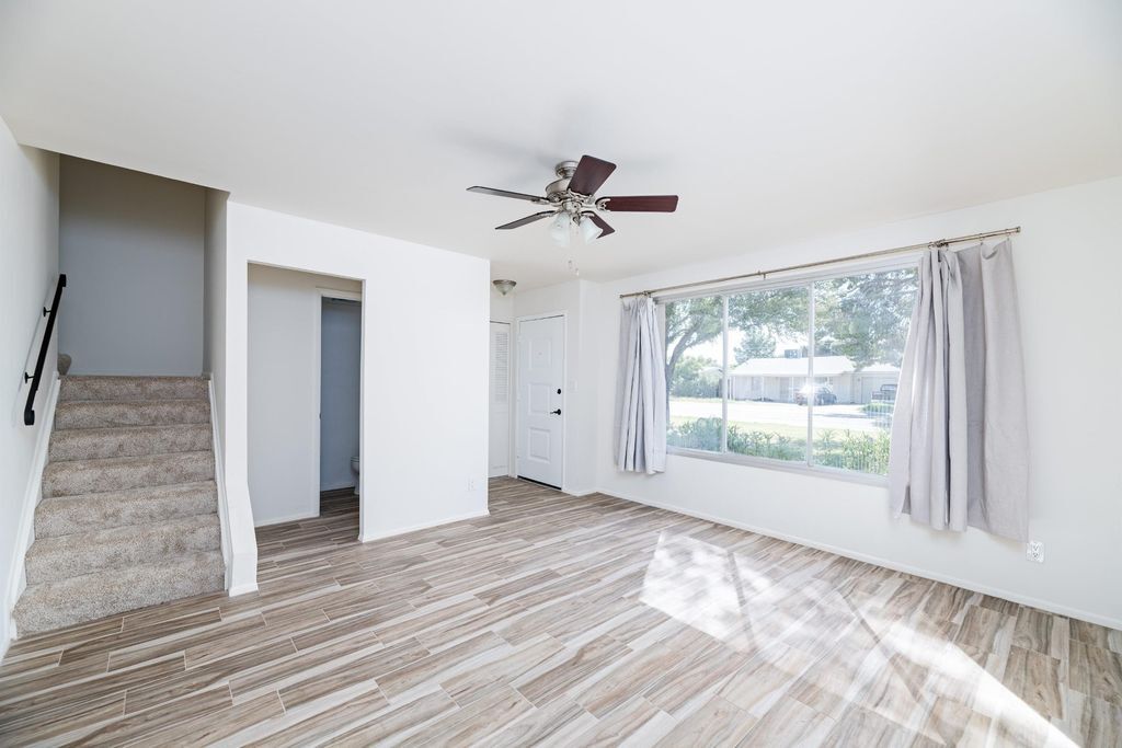 Newly renovated with new modern ceramic tile, carpet, bathrooms, paint, French doors, and window coverings - 1626 W Campbell Ave