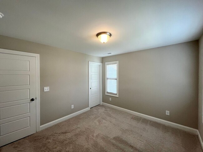 Building Photo - Newly Built 3BD, 2.5BA Durham Home Near Brier Creek, Interstates, and RDU Airport in an HOA Commu...