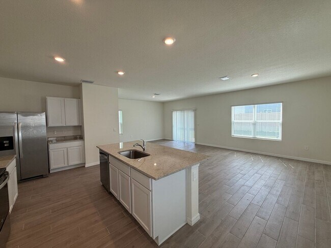 Building Photo - Spacious 4-Bedroom Modern Home in Oaks Preserve – Perfect Gainesville Location