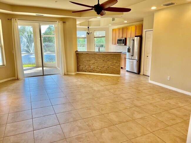 Building Photo - Meadows of Estero 1st floor unit with 2 car garage