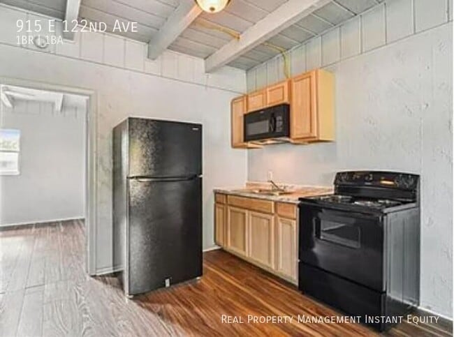 Building Photo - 915 E 122nd Ave