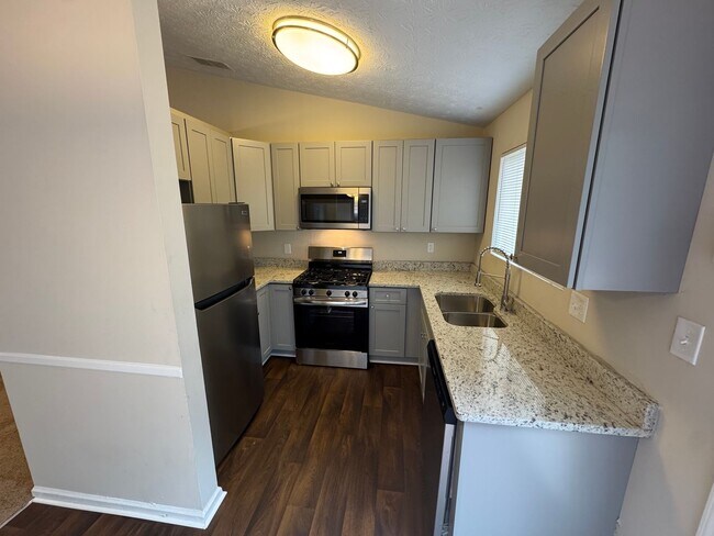 Building Photo - Stone Mountain 4 bed 2 bath Home with Fenced Backyard.