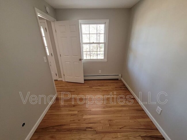 Building Photo - 9/11/13-13 Village Dr