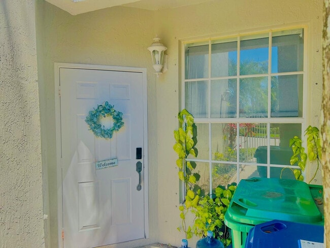 Building Photo - 5665 NW 117th Ave