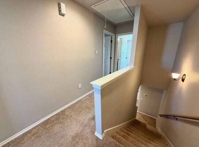 Building Photo - Corner Unit Townhome with 3 Bedrooms, Garage & Private Yard