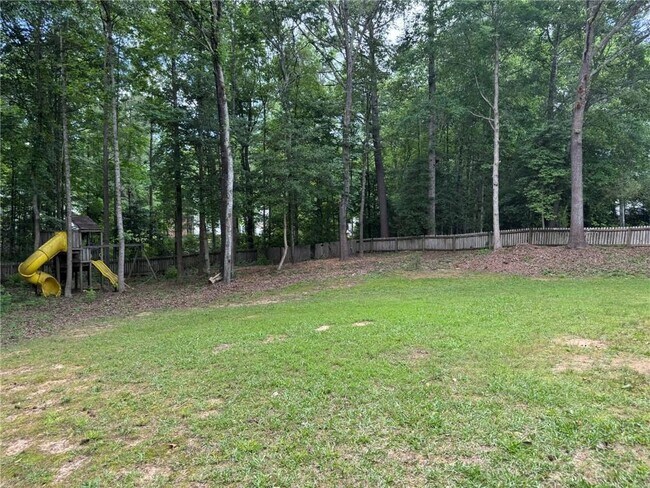 Building Photo - 7454 Woody Springs Dr