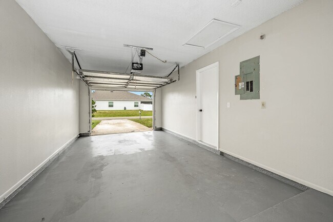 Building Photo - Charming Palm Bay Retreat - Perfect for Relaxation and Entertainment!
