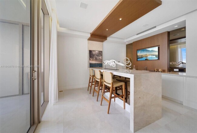 Building Photo - 9701 Collins Ave