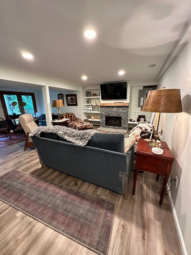 Building Photo - Dream Home in Highland, Michigan: Your Private Oasis on 5 Wooded Acres