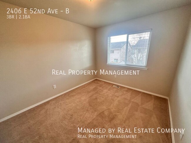 Building Photo - 2406 E 52nd Ave