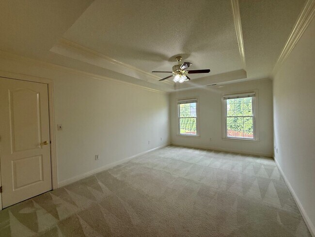 Building Photo - Spacious 5-Bedroom Home on a Corner Lot in...
