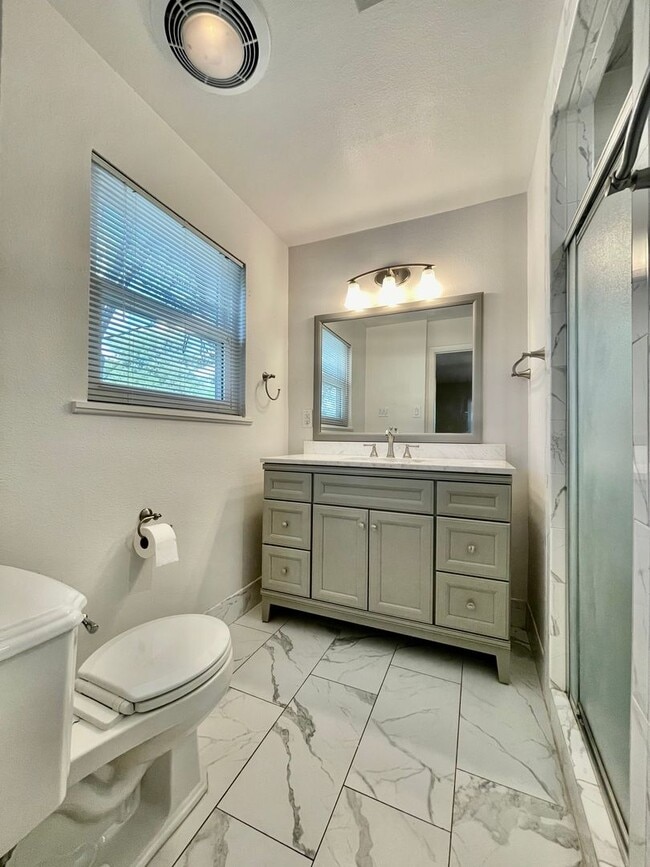 Building Photo - Updated Home w/ 2 Car Garage, Backyard and...