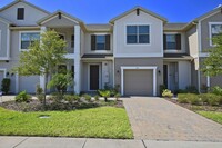 Building Photo - Modern 3/2.5 Spacious Townhome with Gorgeo...
