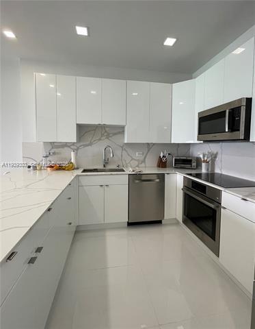 Building Photo - 5701 Collins Ave