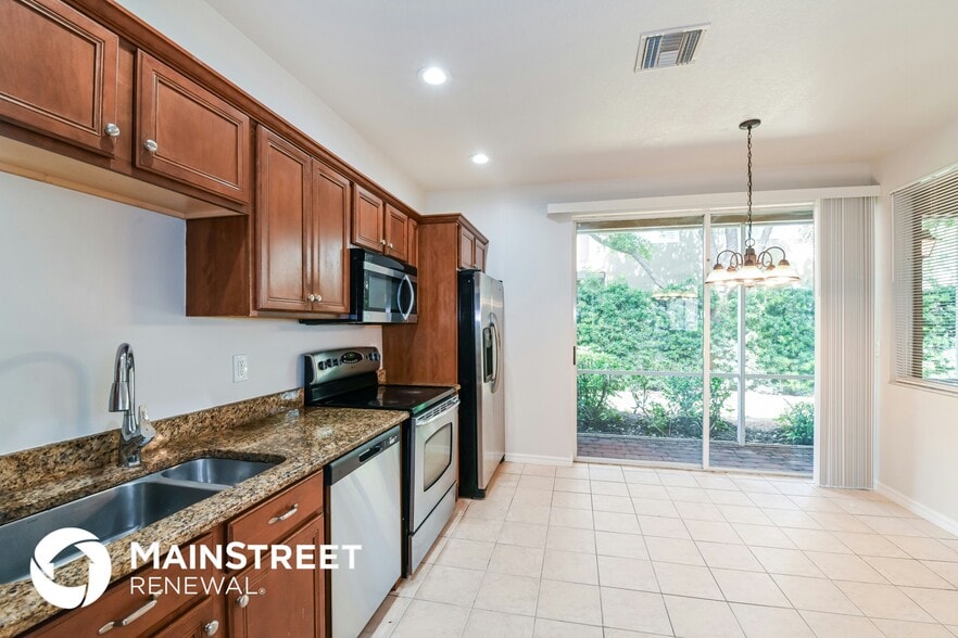 Building Photo - 9793 Roundstone Cir