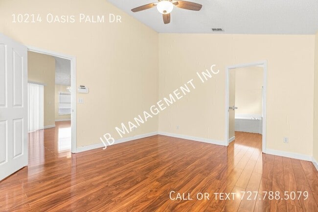 Building Photo - 10214 Oasis Palm Dr