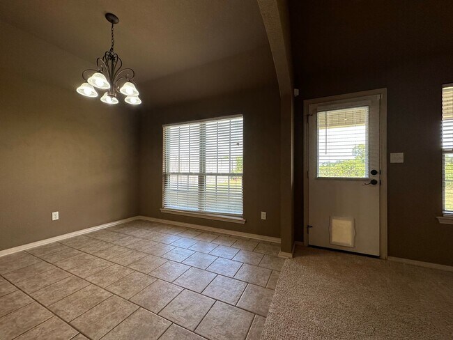 Building Photo - Spacious Elegance: Your Dream 3 Bed, 2 Bath Home with a Cozy Fireplace and 2-Car Garage!