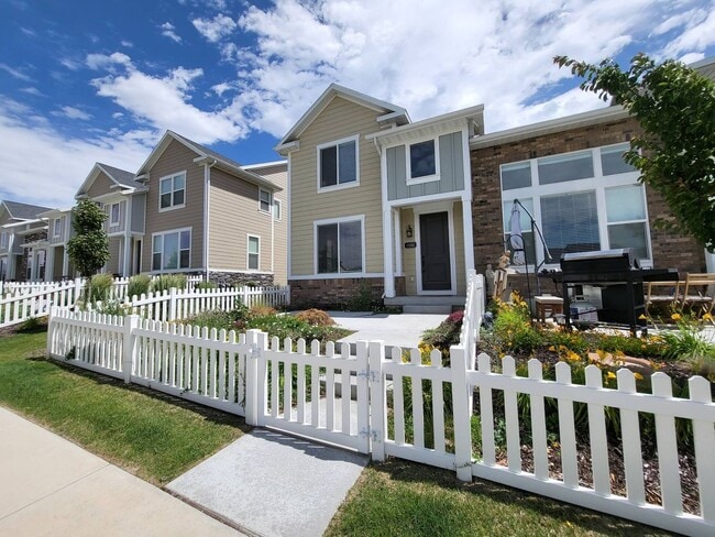 Building Photo - Pet Friendly Gorgeous Row End Townhome w 2 car attached garage!