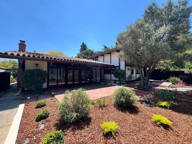 Building Photo - SPACIOUS FOUR BEDROOM TWO AND HALF BATH CH...