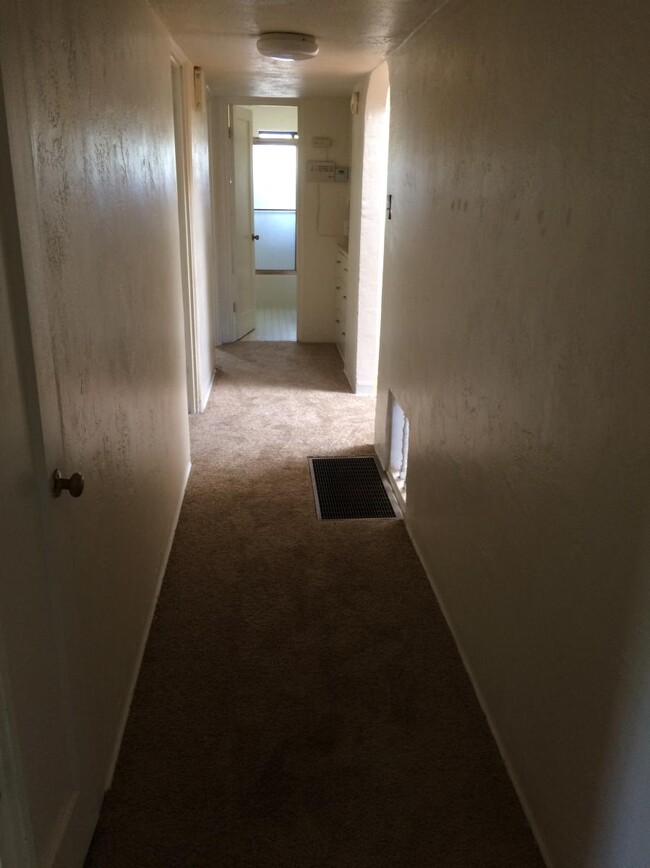 8 admittedly poor picture in hall between lr and bedrooms from br - 1640 Columbia Dr SE