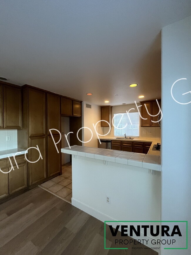 Building Photo - Spacious 4-Bed, 3-Bath Townhouse Retreat at The Gated Community at the Cottages