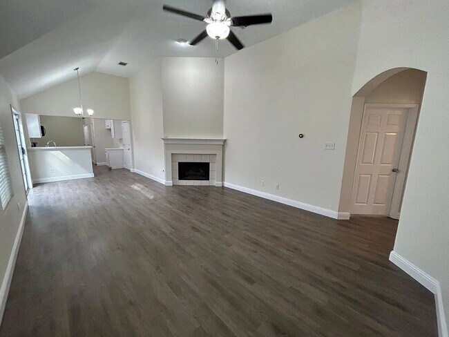 Building Photo - Charming 3-Bedroom Plano Retreat with Cozy Fireplace & Gleaming Hardwood Floors!