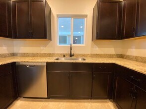 Building Photo - 4 BED 3 BATH Townhome, 1 LOFT, 2 GARAGES, GATED!