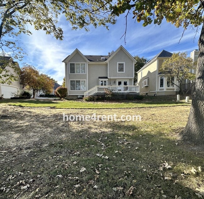 Building Photo - Maintenance Free Living w/ Hardwood Floors, Open Layout, Granite Counters, Finished Basement!