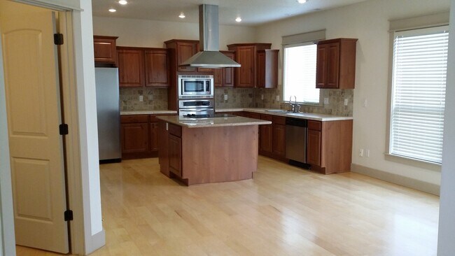 Building Photo - Three bedrooms plus an office.. Gorgeous home in Pepper Hills with tandem 3 car garage. Newer car...