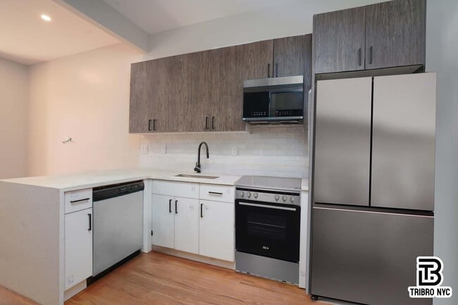 Building Photo - Brand new building 2 bed w/Rooftop!